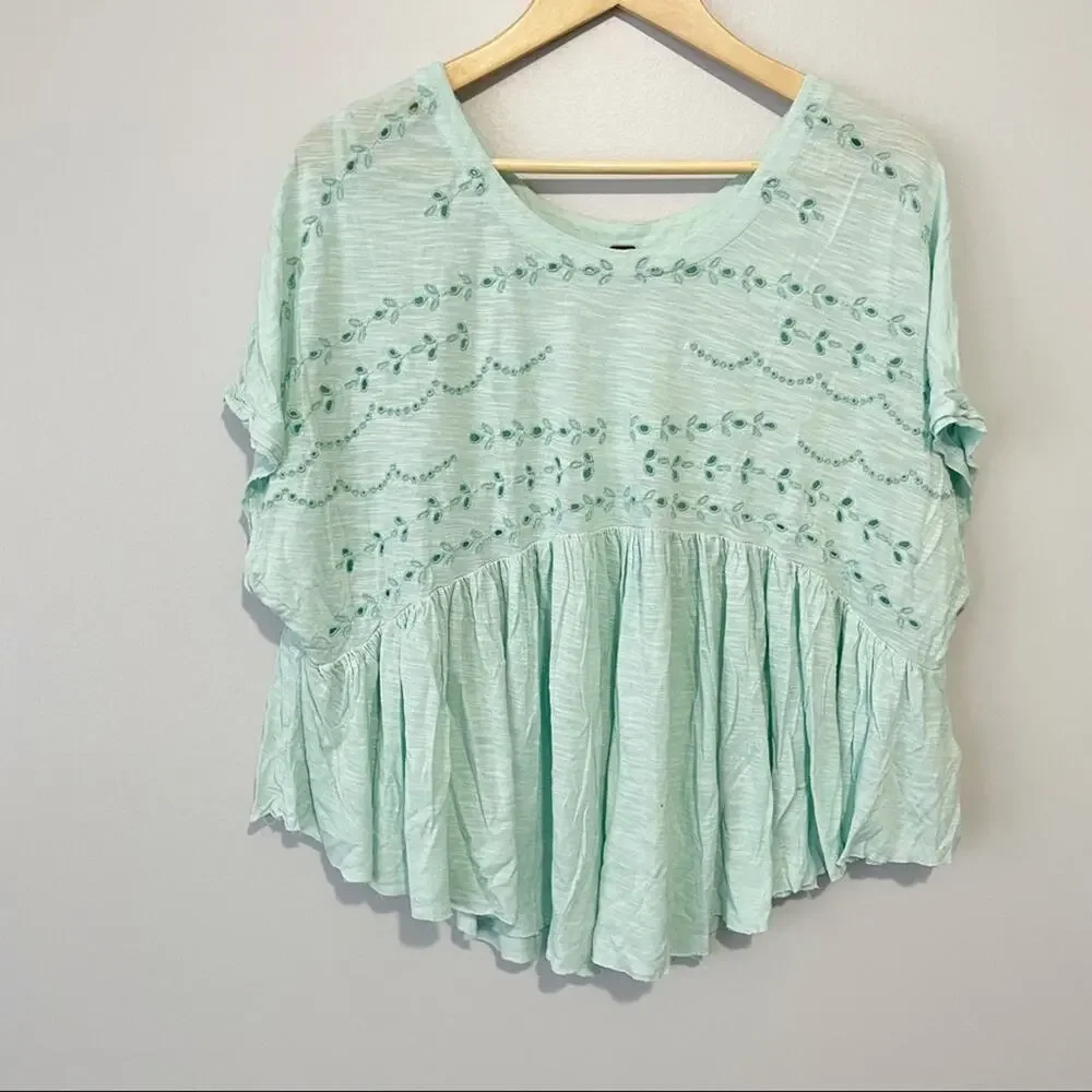 Free People teal green eyelet dolman short sleeve size medium flowy